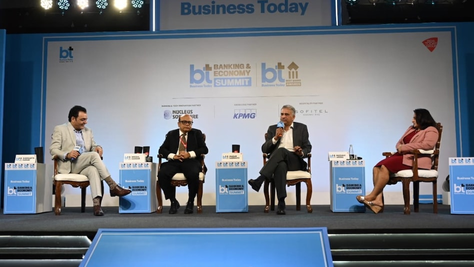 Madan Sabnavis, Chief Economist, Bank of Baroda; Mridul Saggar, Professor at IIM Kozhikode, and Madhavi Arora, Chief Economist, Emkay Global, at BT Banking & Economy Summit. Madan Sabnavis, Chief Economist, Bank of Baroda; Mridul Saggar, Professor at IIM Kozhikode, and Madhavi Arora, Chief Economist, Emkay Global, at BT Banking & Economy Summit.
