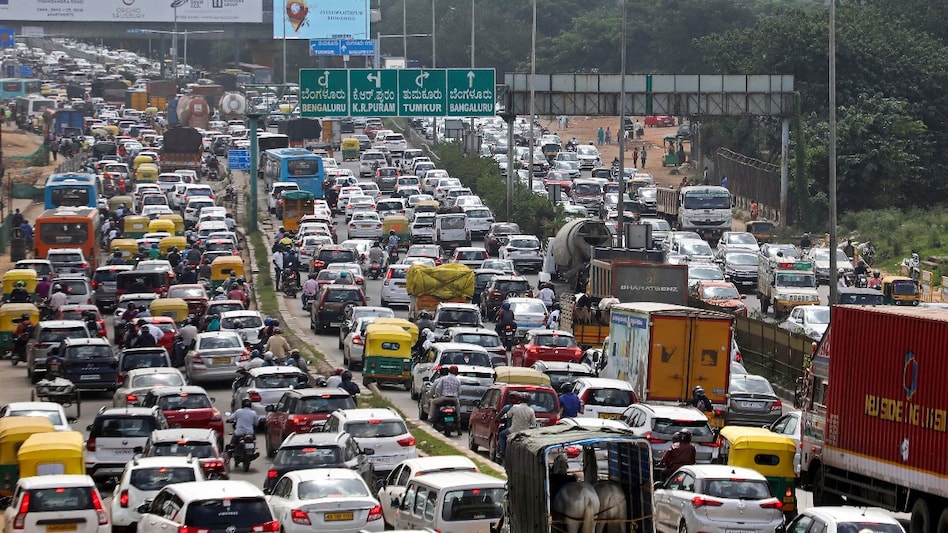 Narrow roads, a surge in vehicles, and an overburdened public transport system have left commuters trapped in gridlock, impacting both productivity and quality of life. Narrow roads, a surge in vehicles, and an overburdened public transport system have left commuters trapped in gridlock, impacting both productivity and quality of life.