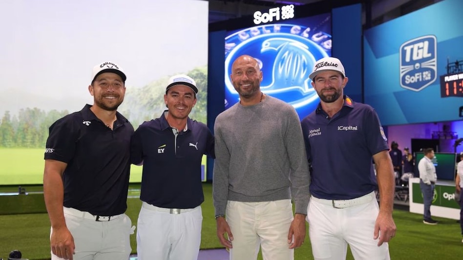 Baseball legend Derek Jeter poses with (from left) Xander Schauffele, Rickie Fowler and Cameron Young ahead of their match against Boston Common GC at the SoFi Centre in Florida on Monday. Image courtesy tglgolf.com. Baseball legend Derek Jeter poses with (from left) Xander Schauffele, Rickie Fowler and Cameron Young ahead of their match against Boston Common GC at the SoFi Centre in Florida on Monday. Image courtesy tglgolf.com.