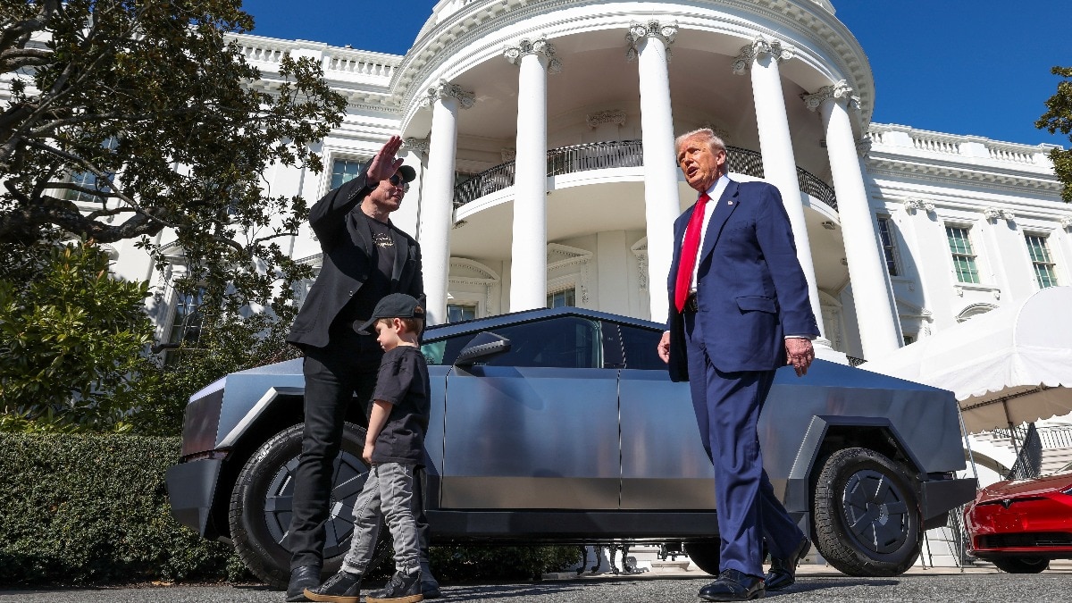 Donald Trump and Elon Musk with Tesla cars in the background at the White House. (Reuters Photo) Donald Trump and Elon Musk with Tesla cars in the background at the White House. (Reuters Photo)