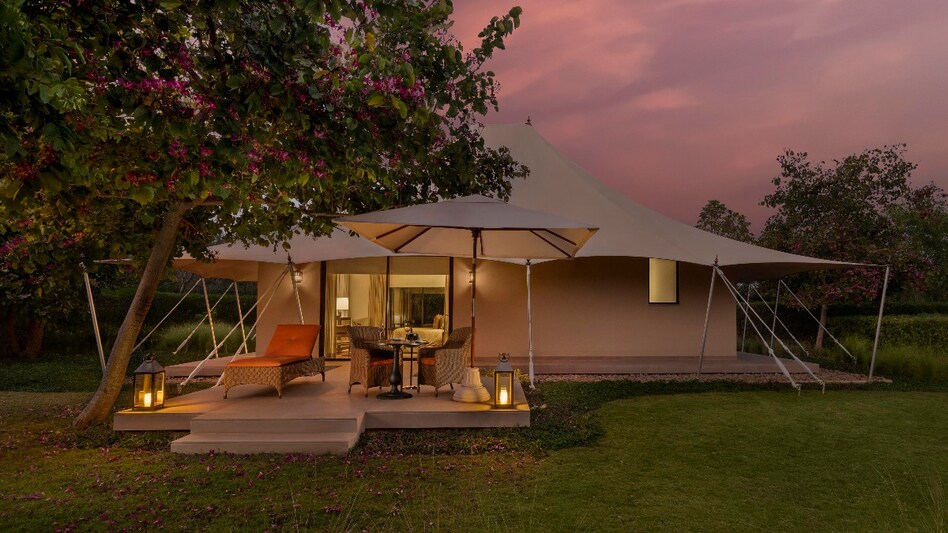 Spread over 21 acres of forested land, the resort offers 19 luxury tents and two private villas with pools, each thoughtfully designed to bring the outdoors in. Spread over 21 acres of forested land, the resort offers 19 luxury tents and two private villas with pools, each thoughtfully designed to bring the outdoors in.