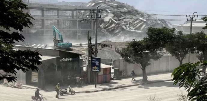View of a collapsed building after a strong earthquake struck central Myanmar on Friday. (Photo: Reuters) View of a collapsed building after a strong earthquake struck central Myanmar on Friday. (Photo: Reuters)