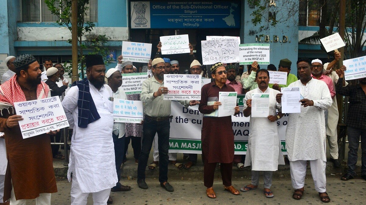 Siliguri Jama Masjid committee members hold posters in protest against the Waqf (Amendment) Act, outside the Office of the Sub-Divisional Officer, in Siliguri, West Bengal on April 11. Siliguri Jama Masjid committee members hold posters in protest against the Waqf (Amendment) Act, outside the Office of the Sub-Divisional Officer, in Siliguri, West Bengal on April 11.