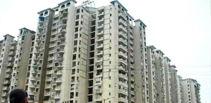 The tribunal stated that the exchange of an old flat for a new property does not trigger a taxable event. The tribunal stated that the exchange of an old flat for a new property does not trigger a taxable event.
