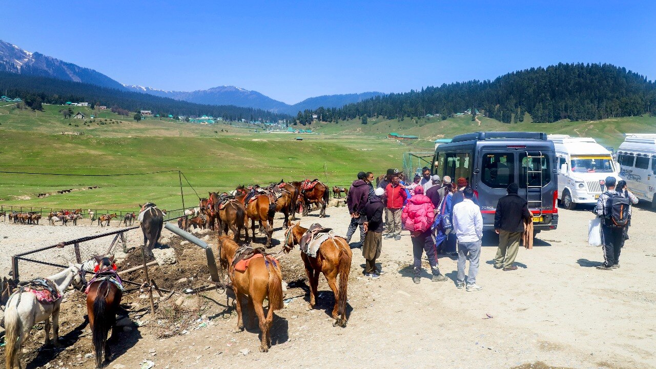 Ponywallahs at a tourist resort of Gulmarg. (Photo: PTI) Ponywallahs at a tourist resort of Gulmarg. (Photo: PTI)