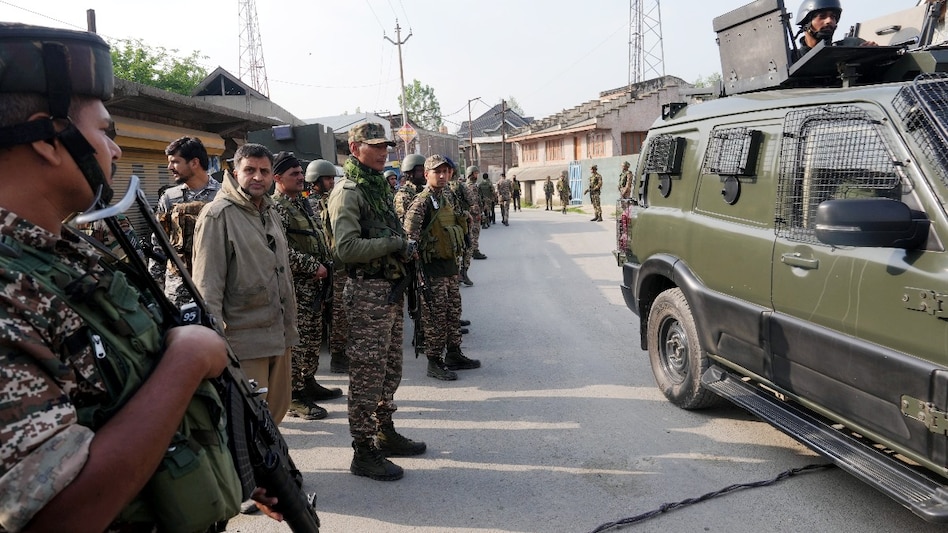 Security personnel during a search operation near the spot where an unknown jet crashed after midnight, at Wuyan, Pampore, in Pulwama district, J&K, Wednesday, May 7, 2025. (Image: PTI) Security personnel during a search operation near the spot where an unknown jet crashed after midnight, at Wuyan, Pampore, in Pulwama district, J&K, Wednesday, May 7, 2025. (Image: PTI)