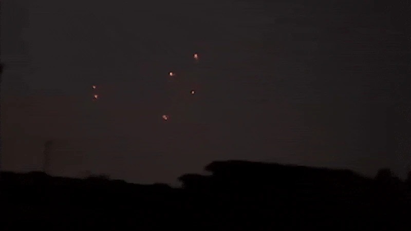 Air Defence Systems continue to respond at rapid intervals, creating ongoing flashes across the skyline. Air Defence Systems continue to respond at rapid intervals, creating ongoing flashes across the skyline.