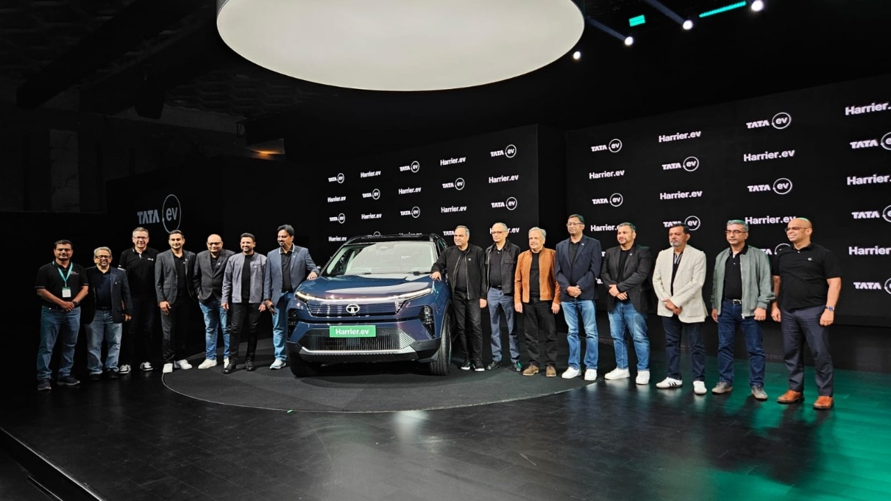Tata officials with the Harrier EV.