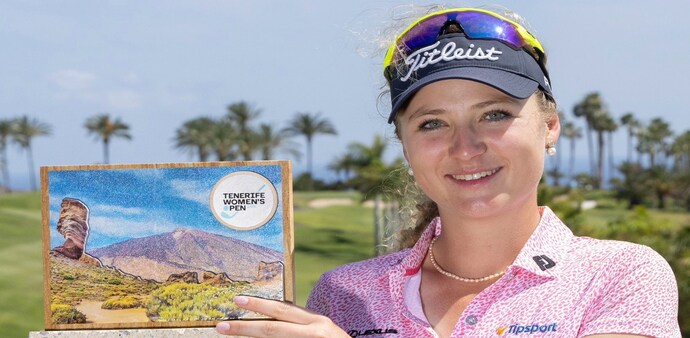 Czech Republic’s Sara Kouskova with the Tenerife Women's Open trophy, her title second in as many tournaments, at Abama Golf in the Canary Islands on Sunday. Image courtesy LET. Czech Republic’s Sara Kouskova with the Tenerife Women's Open trophy, her title second in as many tournaments, at Abama Golf in the Canary Islands on Sunday. Image courtesy LET.