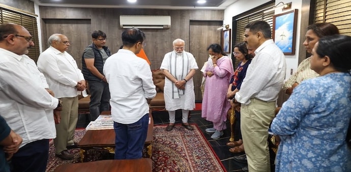 Modi, visibly moved, reflected on their decades-long camaraderie, calling Rupani a “humble and hardworking” leader who stood by him during the state's most trying times. Modi, visibly moved, reflected on their decades-long camaraderie, calling Rupani a “humble and hardworking” leader who stood by him during the state's most trying times.