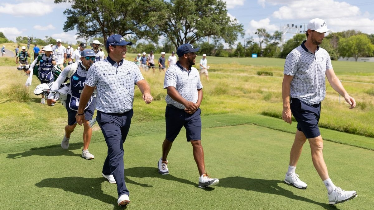 Members of leaders 4Aces GC walk between holes eight and nine during the first round of LIV Golf Dallas at the Maridoe Golf Club in Carrollton on June 28. (Image courtesy: LIV Golf)