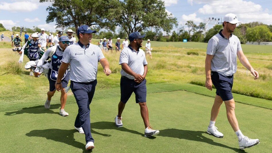 Members of leaders 4Aces GC walk between holes eight and nine during the first round of LIV Golf Dallas at the Maridoe Golf Club in Carrollton on June 28. (Image courtesy: LIV Golf) Members of leaders 4Aces GC walk between holes eight and nine during the first round of LIV Golf Dallas at the Maridoe Golf Club in Carrollton on June 28. (Image courtesy: LIV Golf)