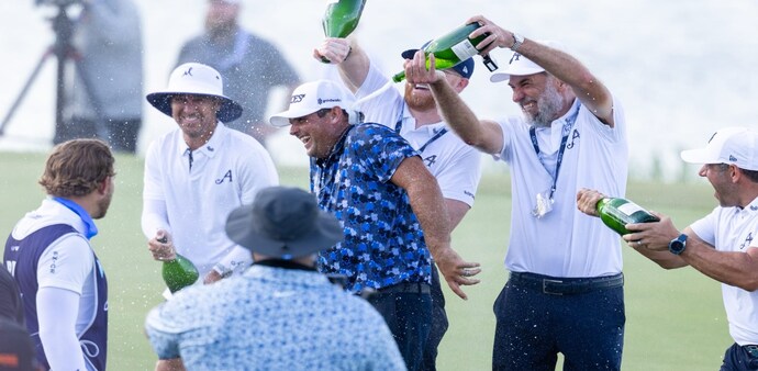 Dallas winner Patrick Reed is doused with champagne by his 4Aces team mates after winning a four-way playoff for his first win in the league. Image courtesy LIV Golf. Dallas winner Patrick Reed is doused with champagne by his 4Aces team mates after winning a four-way playoff for his first win in the league. Image courtesy LIV Golf.