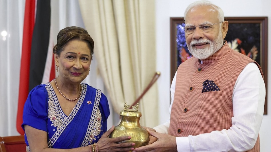 Prime Minister Narendra Modi meets Trinidad and Tobago Prime Minister Kamla Persad-Bissessar during his visit. Prime Minister Narendra Modi meets Trinidad and Tobago Prime Minister Kamla Persad-Bissessar during his visit.