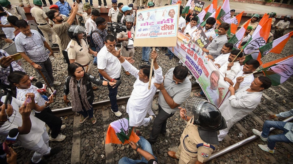 Congress supporters block railway tracks during a protest amid 'Bihar bandh' called by the INDIA bloc Congress supporters block railway tracks during a protest amid 'Bihar bandh' called by the INDIA bloc
