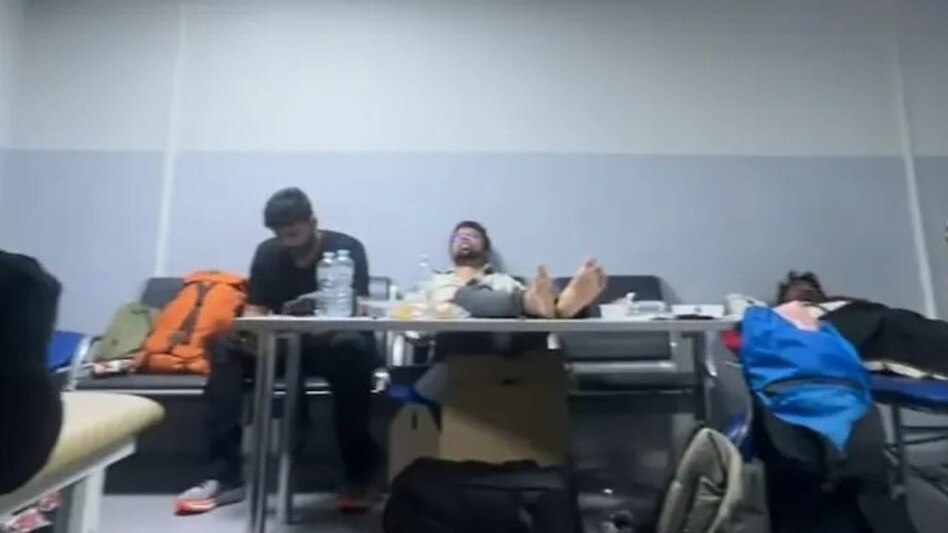 The group was reportedly held in a cramped, locked room along with other detainees. The group was reportedly held in a cramped, locked room along with other detainees.