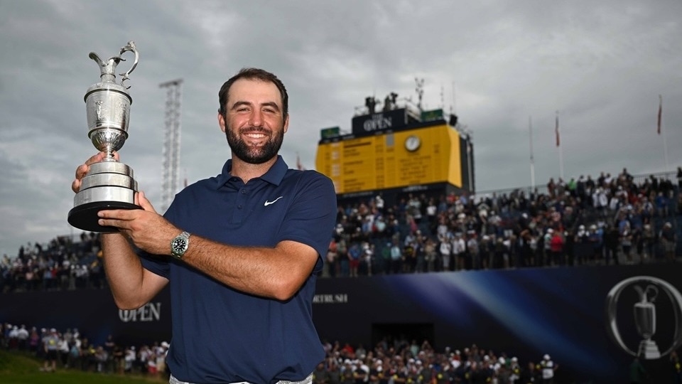Open Championship 2025 and champion golfer of the year Scottie Scheffler with the Claret Jug at Royal Portrush in Northern Ireland on Sunday. Image courtesy theopen.com. Open Championship 2025 and champion golfer of the year Scottie Scheffler with the Claret Jug at Royal Portrush in Northern Ireland on Sunday. Image courtesy theopen.com.