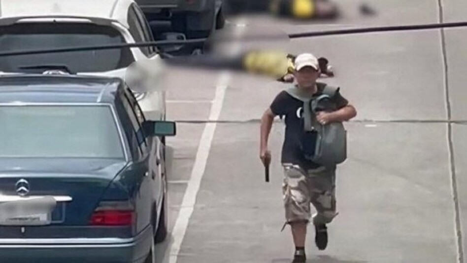 The victims included four security guards at the Or Tor Kor market and a woman. The victims included four security guards at the Or Tor Kor market and a woman.