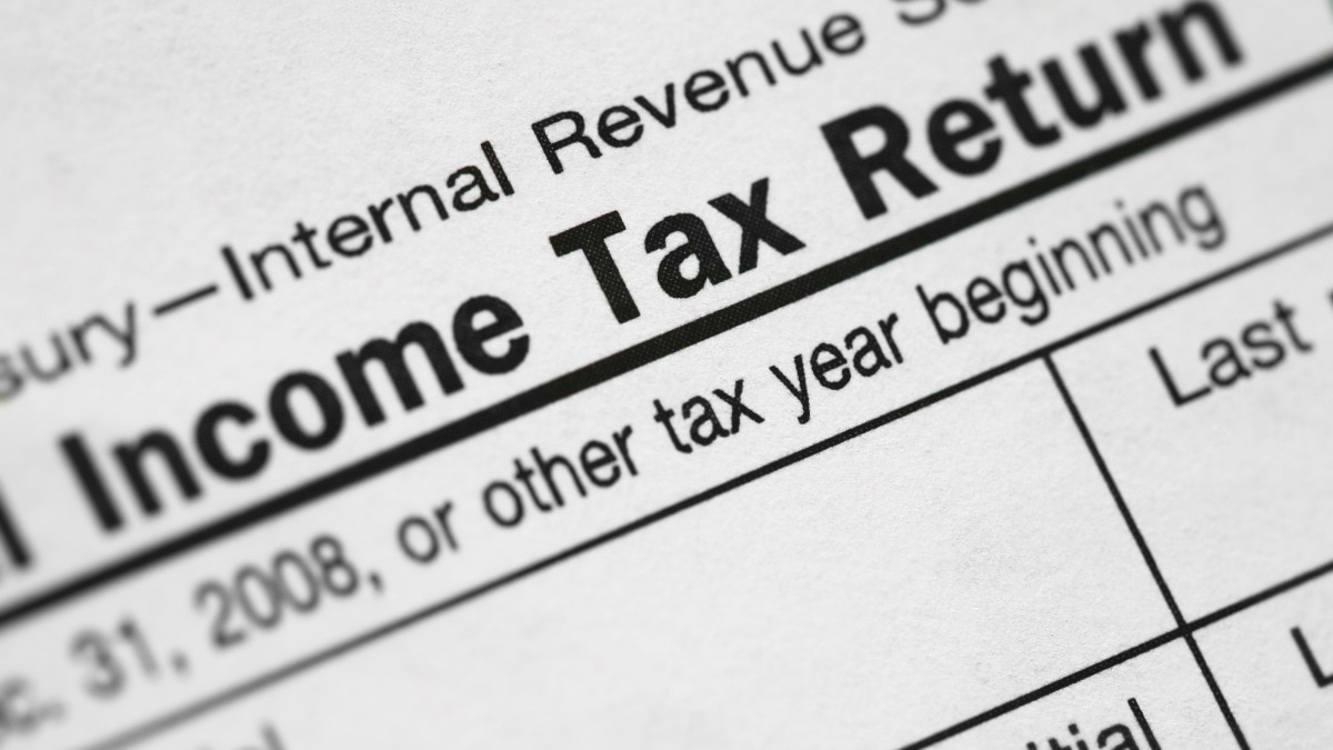 Income from assets transferred to a spouse without adequate consideration is taxable to the transferor.
