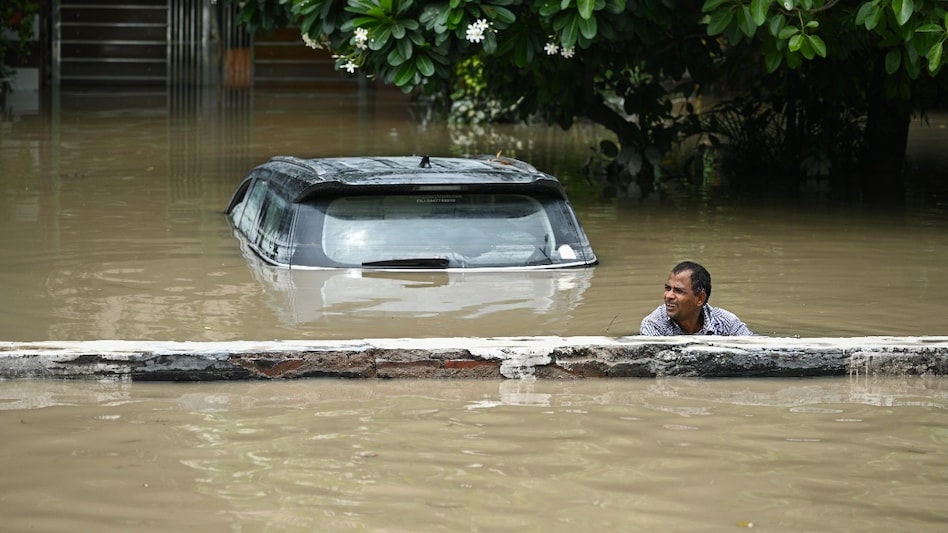 The National Disaster Response Force (NDRF) teams are patrolling the flooded areas and helping move people to safer places. The National Disaster Response Force (NDRF) teams are patrolling the flooded areas and helping move people to safer places.