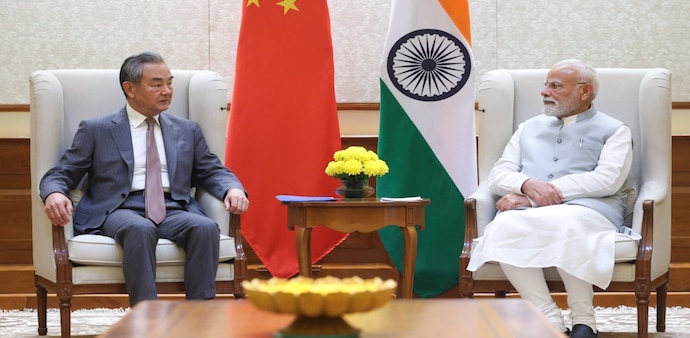 PM Modi meets visiting Chinese FM Wang Yi PM Modi meets visiting Chinese FM Wang Yi