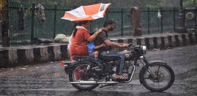 Delhi woke up to light to moderate rain at many places on Monday morning. Delhi woke up to light to moderate rain at many places on Monday morning.