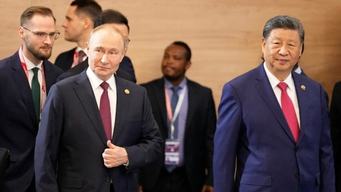 Putin says Russia will match China’s visa-free easing in a historic step for travel ties Putin says Russia will match China’s visa-free easing in a historic step for travel ties
