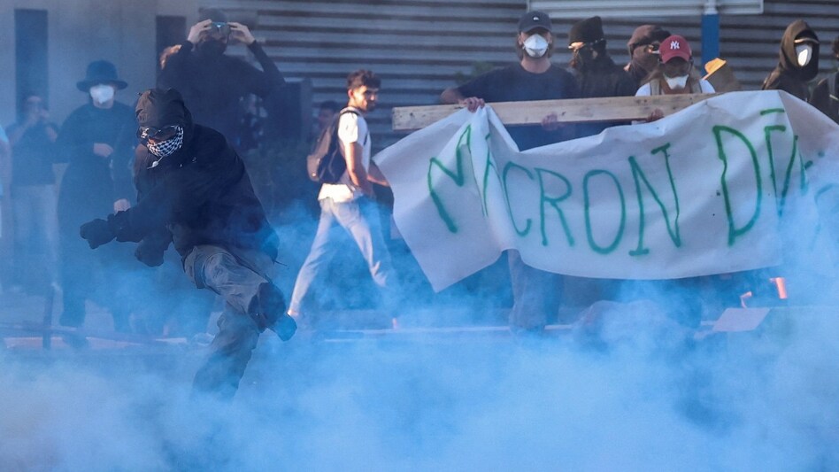France’s ‘Block Everything’ protest: A demonstrator kicks away a tear gas canister as people gather to block traffic France’s ‘Block Everything’ protest: A demonstrator kicks away a tear gas canister as people gather to block traffic