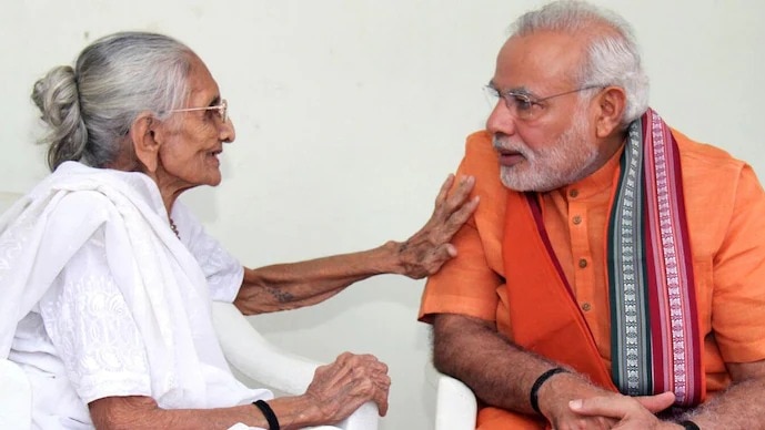 PM Narendra Modi with his mother Heeraben PM Narendra Modi with his mother Heeraben