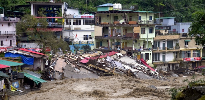 Uttarakhand rains: Houses near the river lie in ruins after a cloudburst and landslides in Dehradun Uttarakhand rains: Houses near the river lie in ruins after a cloudburst and landslides in Dehradun