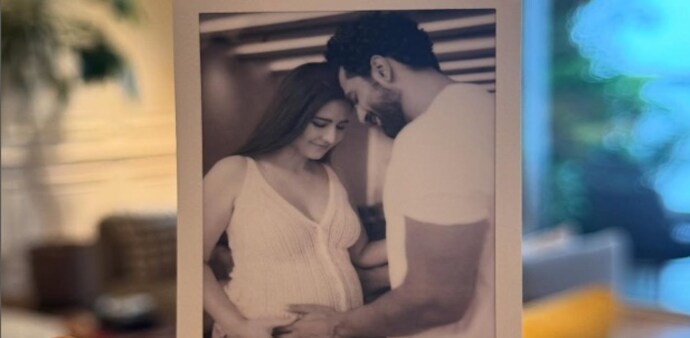 Katrina shared a picture of Kaushal holding a black-and-white photograph Katrina shared a picture of Kaushal holding a black-and-white photograph