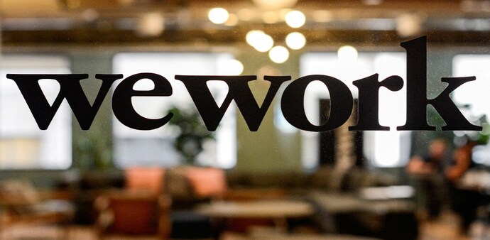 A WeWork logo is seen at a WeWork office in San Francisco, California, U.S. September 30, 2019. A WeWork logo is seen at a WeWork office in San Francisco, California, U.S. September 30, 2019.