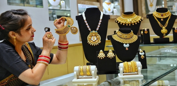 Analysts say the festive season demand, coupled with central bank buying and investor appetite for safe-haven assets, is likely to keep gold shining in the months ahead. Analysts say the festive season demand, coupled with central bank buying and investor appetite for safe-haven assets, is likely to keep gold shining in the months ahead.