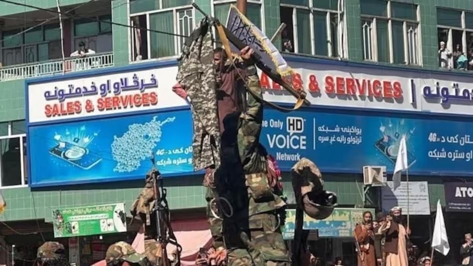 A Taliban fighter hangs trousers and weapons of captured Pakistani troops at multiple places after recent clashes between Pakistan and Afghanistan. A Taliban fighter hangs trousers and weapons of captured Pakistani troops at multiple places after recent clashes between Pakistan and Afghanistan.