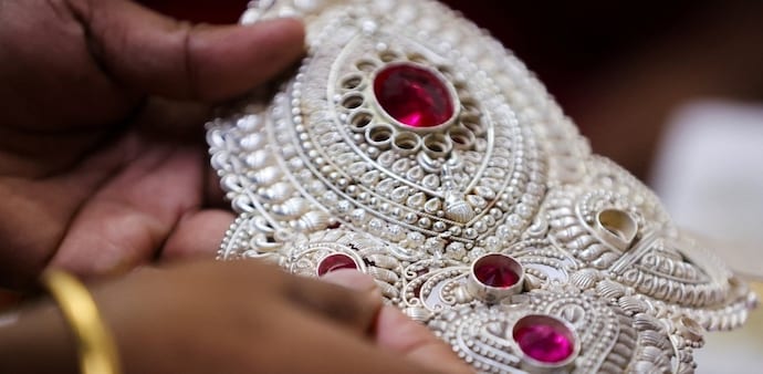 Emkay said the recent softening in silver prices is a short-term correction and expects the metal to recover to $52–53 an ounce in the near term. Emkay said the recent softening in silver prices is a short-term correction and expects the metal to recover to $52–53 an ounce in the near term.