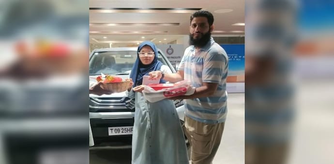 Photo of Dr Shaheen and Dr Muzammil taking possession of Brezza that was seized from Al-Falah University Photo of Dr Shaheen and Dr Muzammil taking possession of Brezza that was seized from Al-Falah University