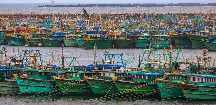 Boats moored at the shore amid gusty winds in view of Cyclone 'Ditwah', at Kasimedu fishing harbour in Chennai on November 29. Boats moored at the shore amid gusty winds in view of Cyclone 'Ditwah', at Kasimedu fishing harbour in Chennai on November 29.