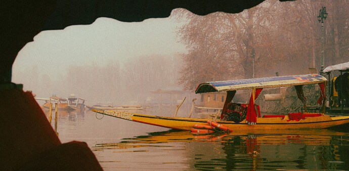 The freezing conditions have brought shikara rides to a halt, affecting both locals and tourists who have gathered to witness the unusual phenomenon. The freezing conditions have brought shikara rides to a halt, affecting both locals and tourists who have gathered to witness the unusual phenomenon.