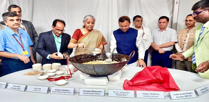 The ceremony involves the preparation and serving of the dessert ‘halwa’ to the officials and staff involved in budget preparation. (Photo: PTI) The ceremony involves the preparation and serving of the dessert ‘halwa’ to the officials and staff involved in budget preparation. (Photo: PTI)