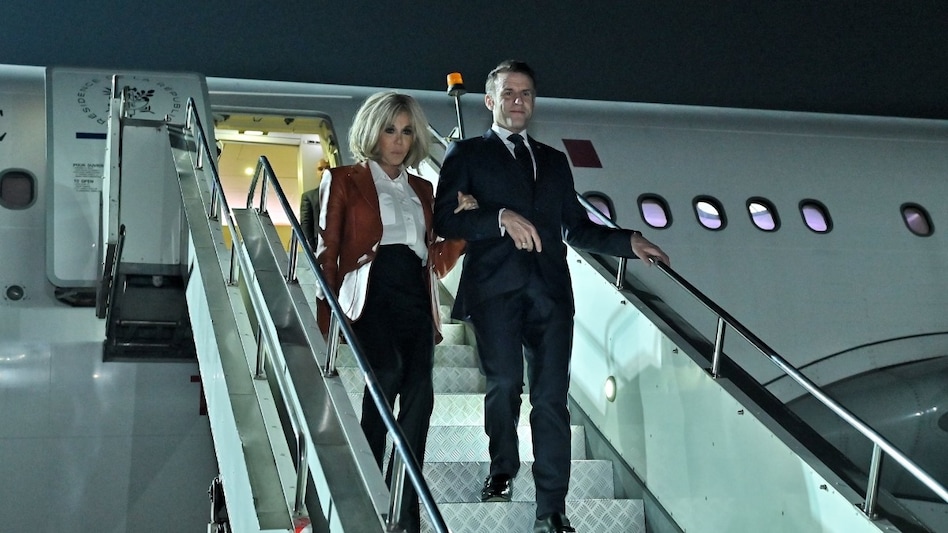 French President Emmanuel Macron arrives in Mumbai with his wife, First Lady of France, Brigitte Macron French President Emmanuel Macron arrives in Mumbai with his wife, First Lady of France, Brigitte Macron