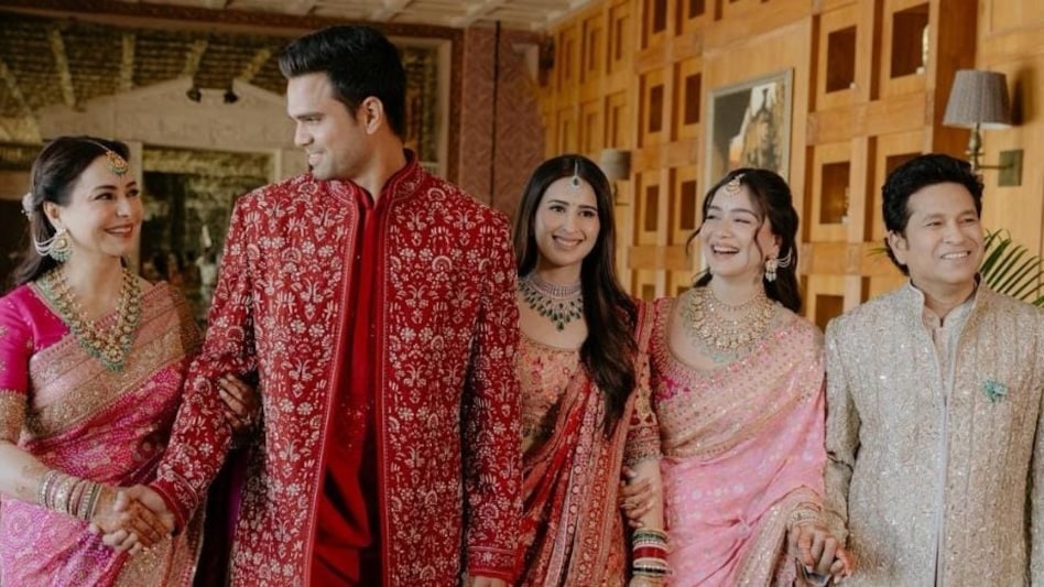 Sachin Tendulkar and Anjali Tendulkar were present at the ceremony, blessing the couple as they began their new journey together. Sachin Tendulkar and Anjali Tendulkar were present at the ceremony, blessing the couple as they began their new journey together.