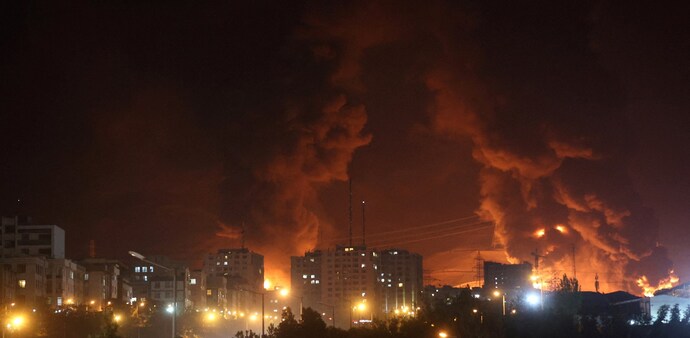 A huge fire at Sharan Oil depot in Tehran following Israeli strikes on Iran. (Photo: Reuters) A huge fire at Sharan Oil depot in Tehran following Israeli strikes on Iran. (Photo: Reuters)