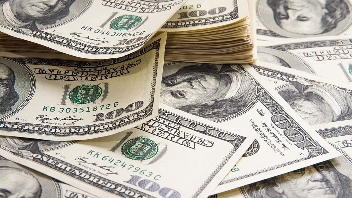 Dollar index nears 100 mark