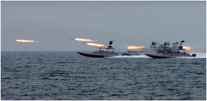 Iran attacks US ships after it seized an Iranian vessel Iran attacks US ships after it seized an Iranian vessel