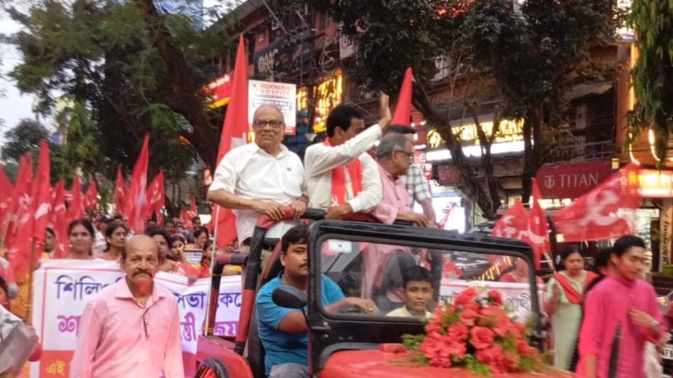 CPIM's veteran leader Ashok Bhattacharya during a roadshow for Siliguri candidate Saradindu Chakraborty CPIM's veteran leader Ashok Bhattacharya during a roadshow for Siliguri candidate Saradindu Chakraborty