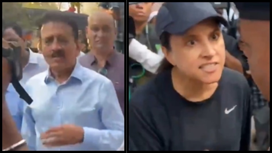 On Tuesday, a frustrated Mumbaikar confronted Mahajan and police personnel after a political procession led to heavy traffic congestion in Worli. On Tuesday, a frustrated Mumbaikar confronted Mahajan and police personnel after a political procession led to heavy traffic congestion in Worli.