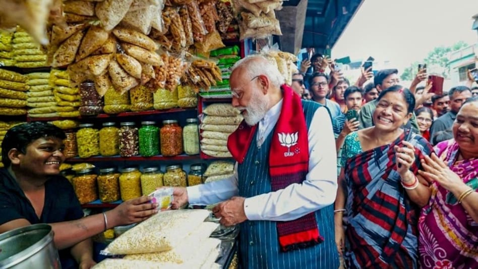The moment unfolded in Jhargram, where the Prime Minister paused between rallies to sample jhalmuri, a staple Bengali street snack. The moment unfolded in Jhargram, where the Prime Minister paused between rallies to sample jhalmuri, a staple Bengali street snack.