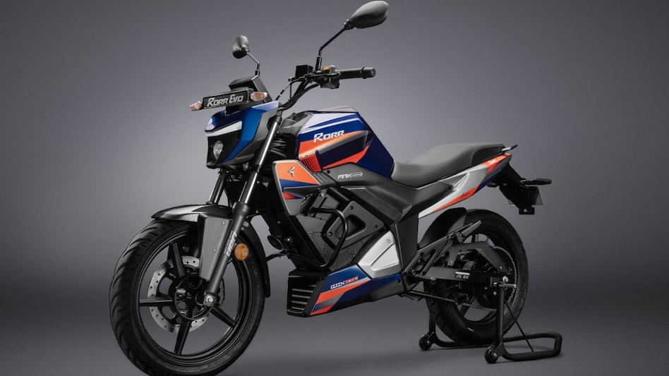 The motorbike is powered by an in-house 9 kW motor paired with a single-stage chain drive, delivering a 0-40 kmph sprint in 3 seconds, and a top speed of 110 km/h. The motorbike is powered by an in-house 9 kW motor paired with a single-stage chain drive, delivering a 0-40 kmph sprint in 3 seconds, and a top speed of 110 km/h.