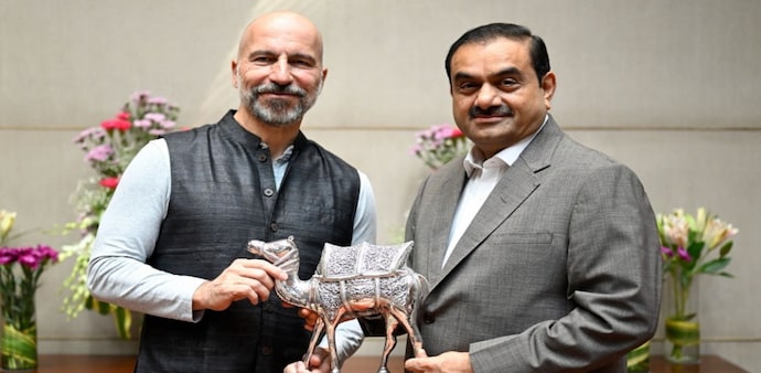 Uber CEO Dara Khosrowshahi announced the development on May 13 after meeting Gautam Adani in Ahmedabad. Uber CEO Dara Khosrowshahi announced the development on May 13 after meeting Gautam Adani in Ahmedabad.