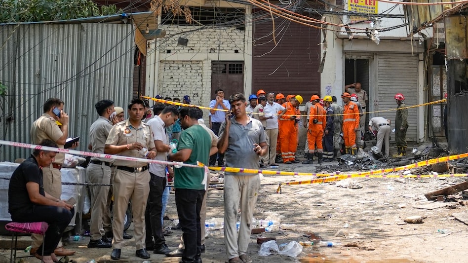 Police cordon off the area after a fire broke out at a bed-and-breakfast in south Delhi's Malviya Nagar area Police cordon off the area after a fire broke out at a bed-and-breakfast in south Delhi's Malviya Nagar area